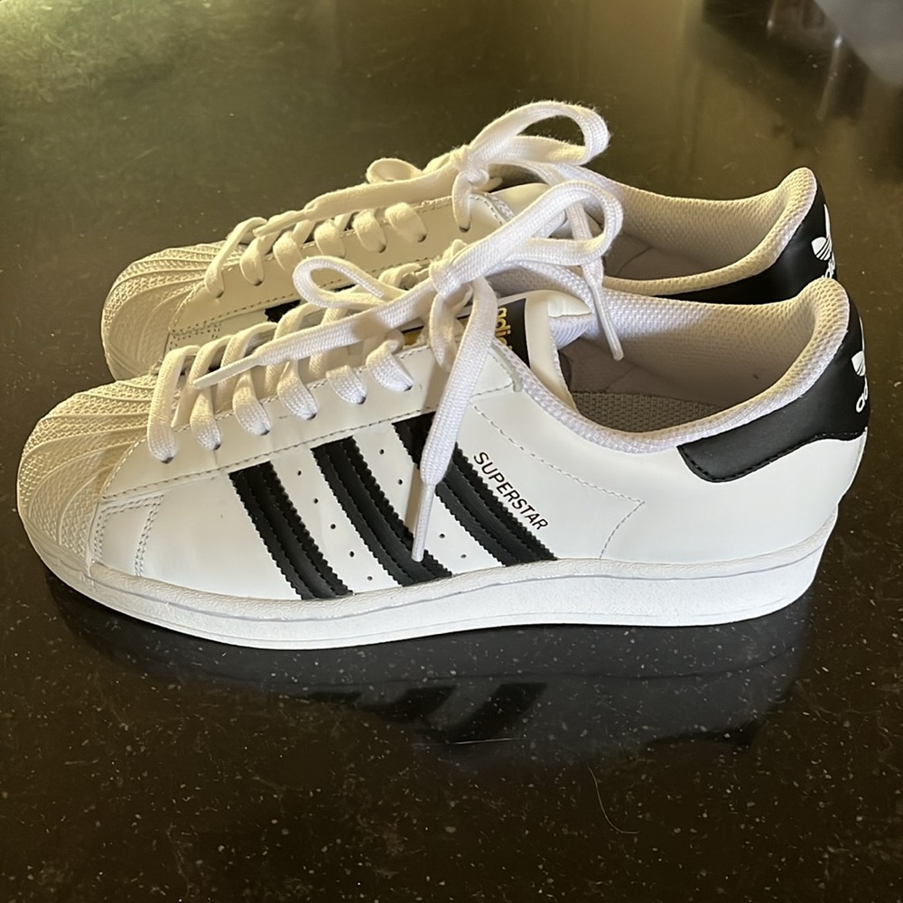 Adidas Women’s Superstar Sneakers. 
Includes original box.  Tried on only.